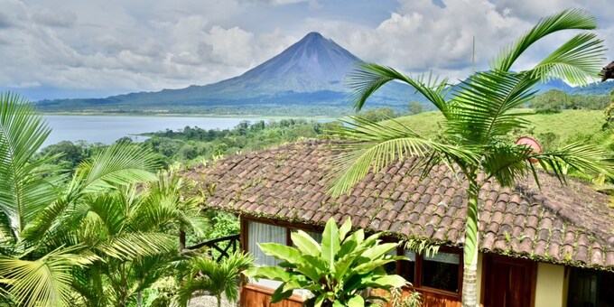 <p>Escape to a romantic haven with breathtaking views at Pie in the Sky 1, a charming studio style cottage nestled amidst the lush landscapes of Lake Arenal, in El Castillo. This secluded retreat offers the perfect blend of privacy and modern comforts, featuring air conditioning, Wi-Fi, a TV, and a kitchenette.  Share intimate moments on your private patio or venture out to the shared swimming pool, jacuzzi, and BBQ deck, all while soaking in the awe-inspiring panorama of the volcano and lake.  With easy access to thrilling adventures like volcano hikes, ziplining, and waterfall explorations, as well as the vibrant town of La Fortuna, Pie in the Sky 1 provides an unforgettable setting for your Costa Rican escape.  Whether you're seeking relaxation or adventure, this charming cottage promises a truly romantic getaway.</p>