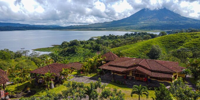 <p>Escape to the breathtaking beauty of Lake Arenal with Pie in the Sky 3, a spacious five-bedroom villa offering stunning water views and modern comforts for groups of up to 15 people. Relax in the shared swimming pool and jacuzzi, prepare delicious meals in the fully-equipped kitchen, or unwind in front of the big-screen TV. Each bedroom features air conditioning and a hair dryer, ensuring a restful stay.  Venture out to explore nearby attractions like Arenal Volcano, hanging bridges, and waterfalls, or simply soak in the tranquility of your private retreat. With its beautiful location in El Castillo and ample amenities, Pie in the Sky 3 promises an unforgettable vacation experience in one of Costa Rica's most captivating destinations.</p>